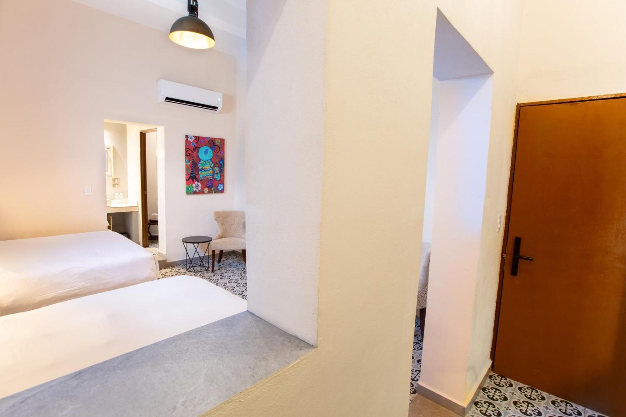 Acqua In Bocca Hotel Merida Room photo
